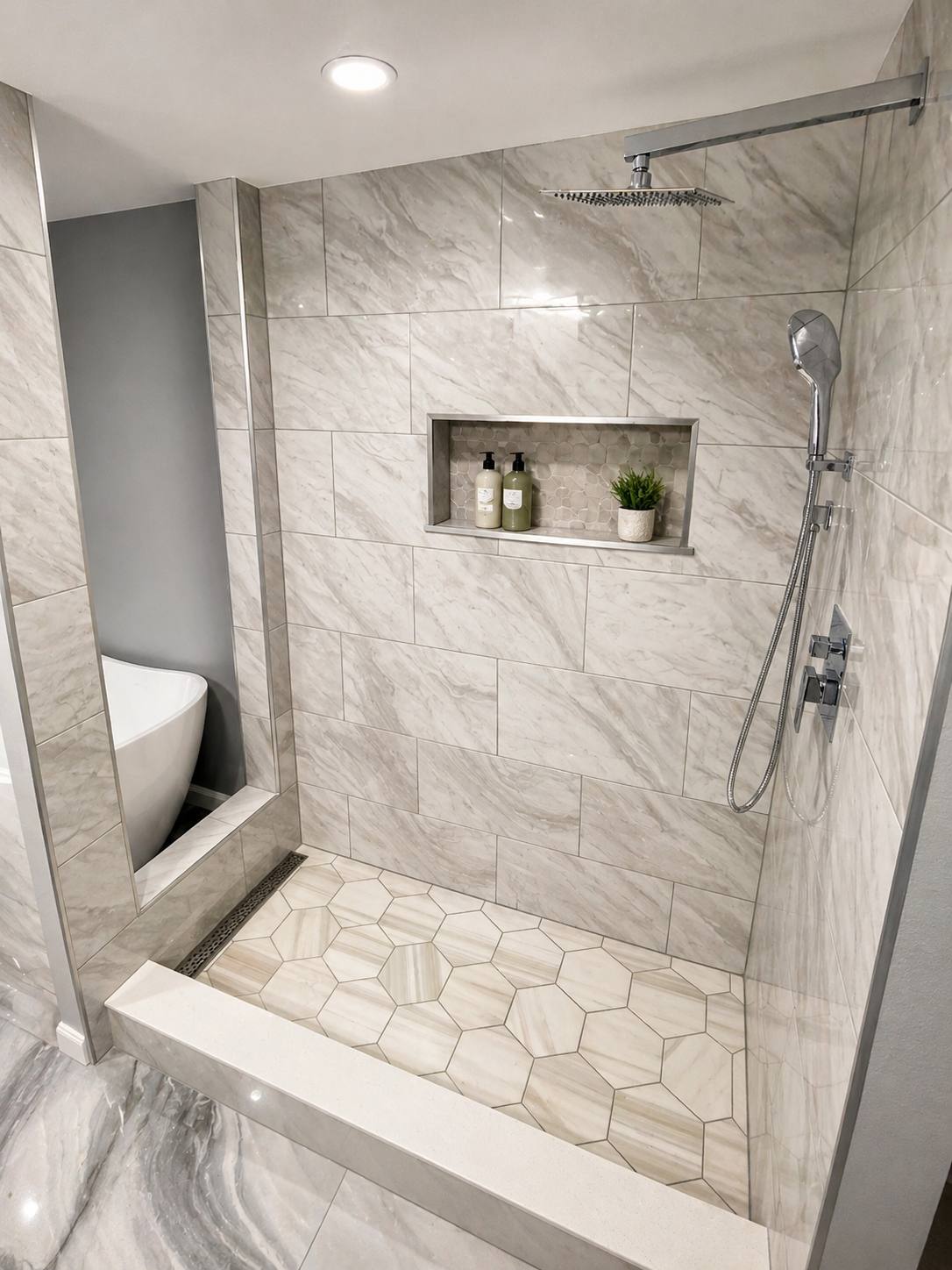 Marble shower with detailed tile work