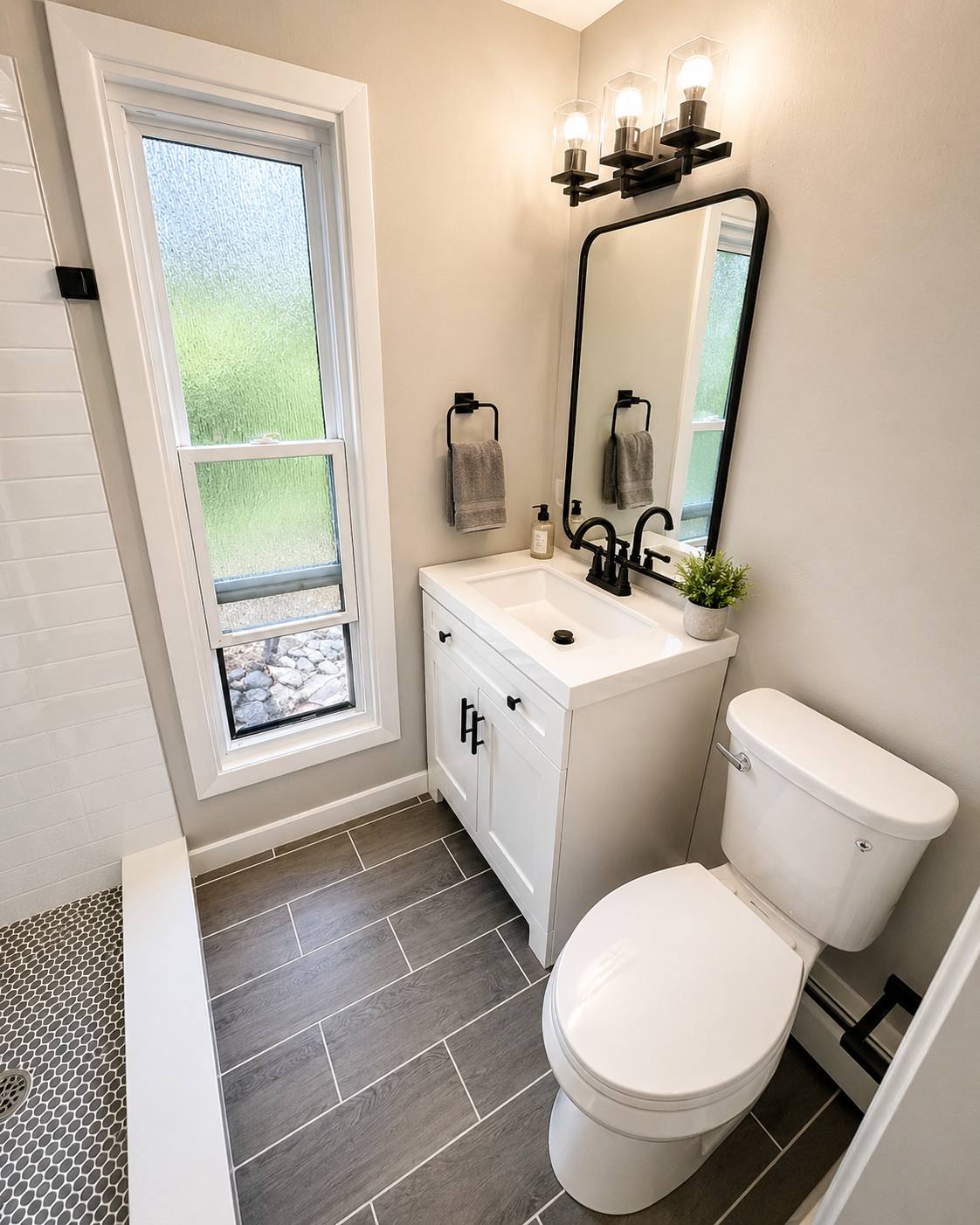 Bathroom with white vanity and mirror