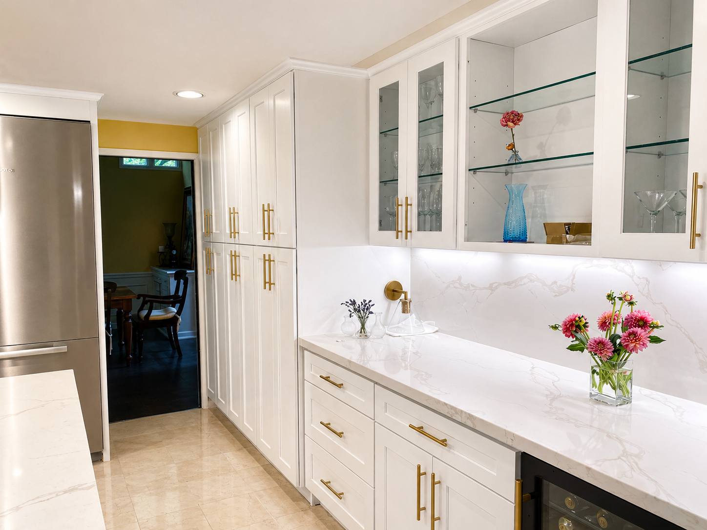 Butler's pantry with glass-front cabinets
